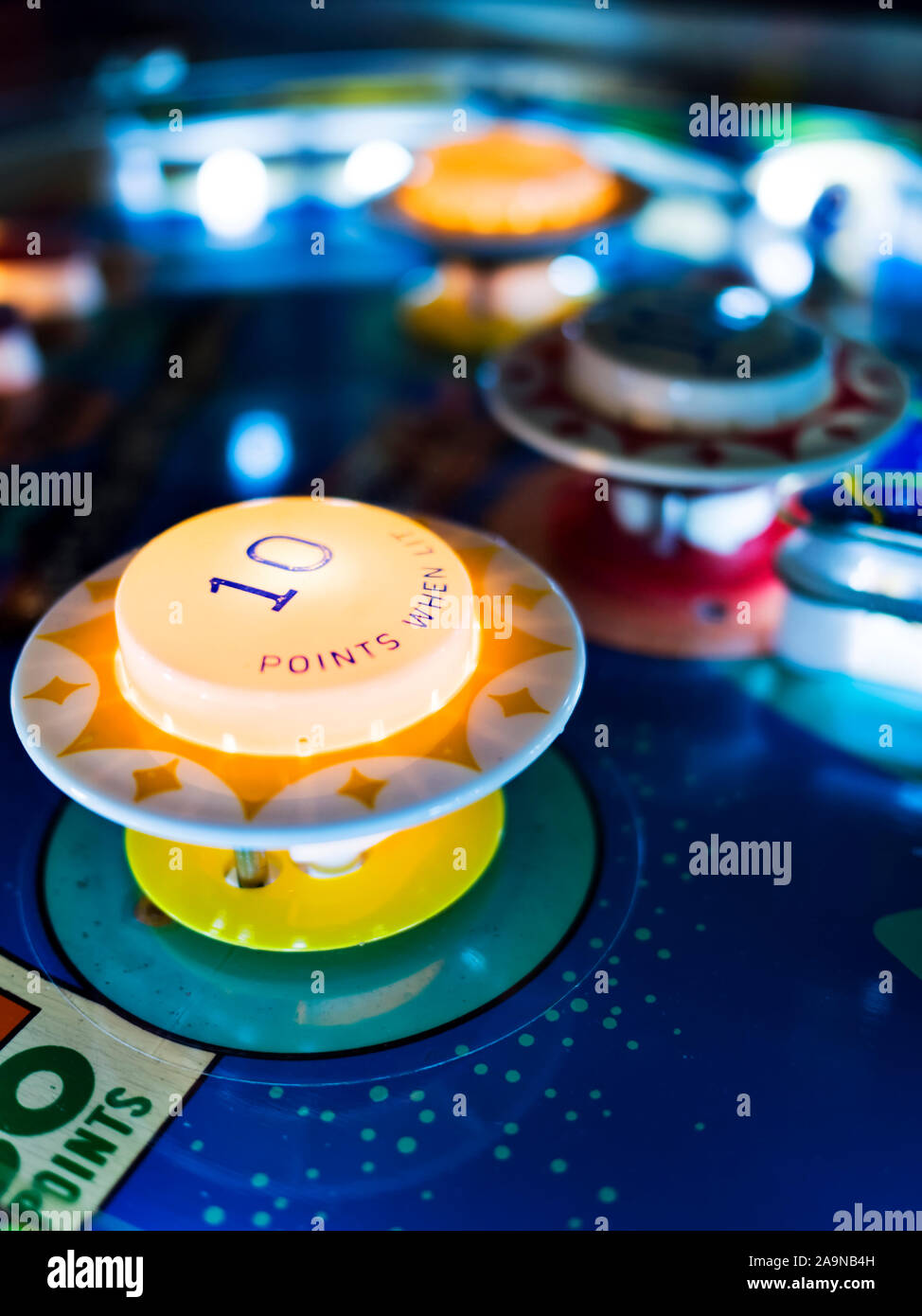 Antique Pinball Machine Bumpers with Motion Blur Ball Stock Photo Alamy