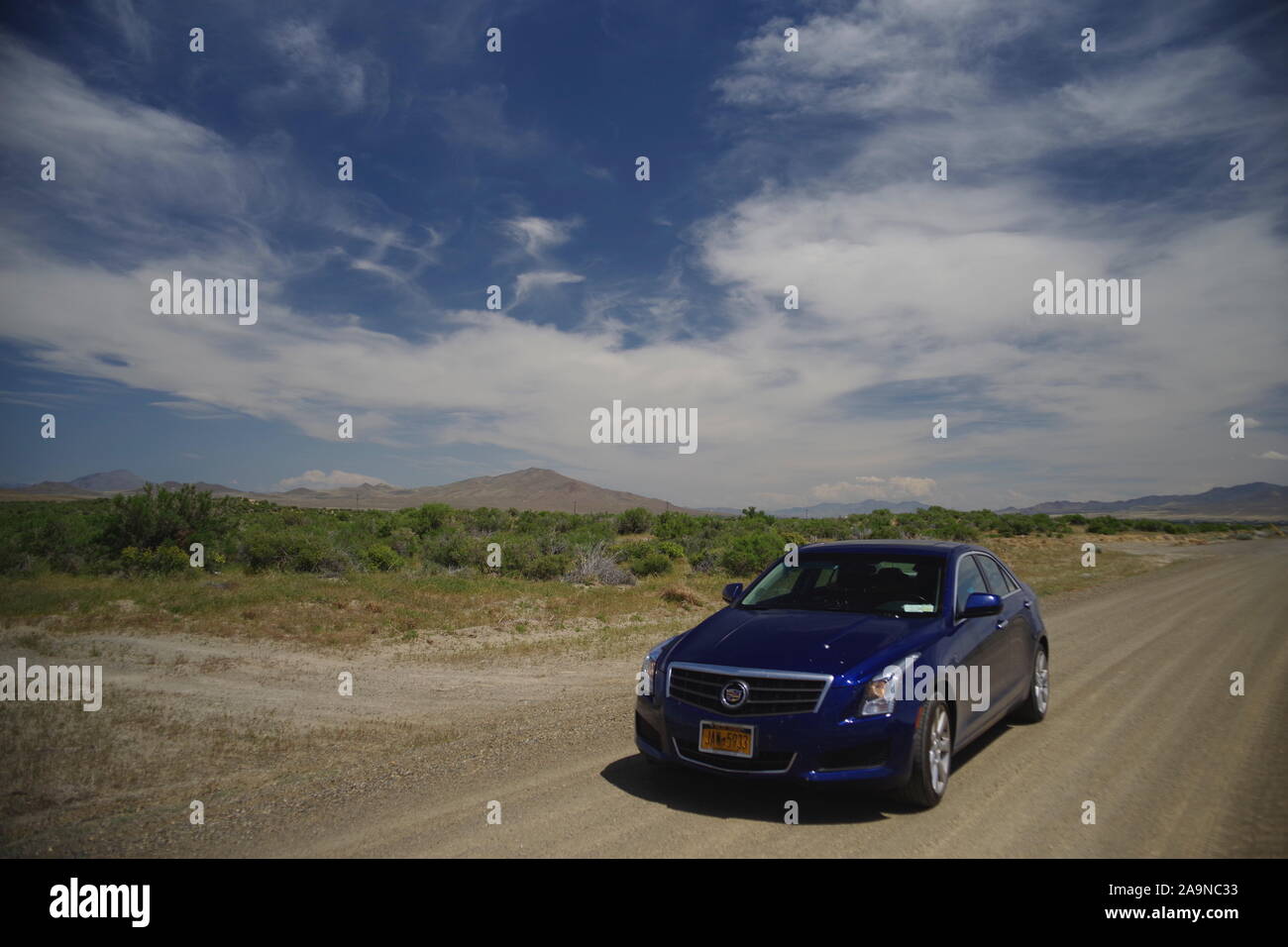 Cadillac at the desert crossroad Stock Photo