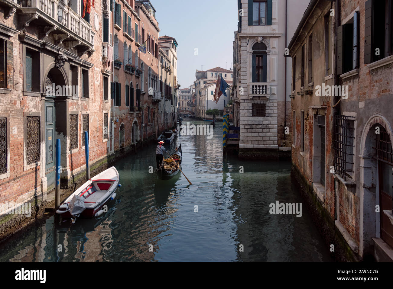View of a Venice canal with gondolier Stock Photo