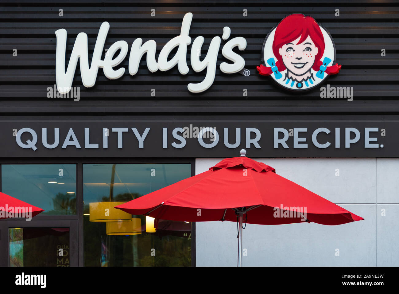 Wendy's fast-food restaurant signage featuring company slogan ...