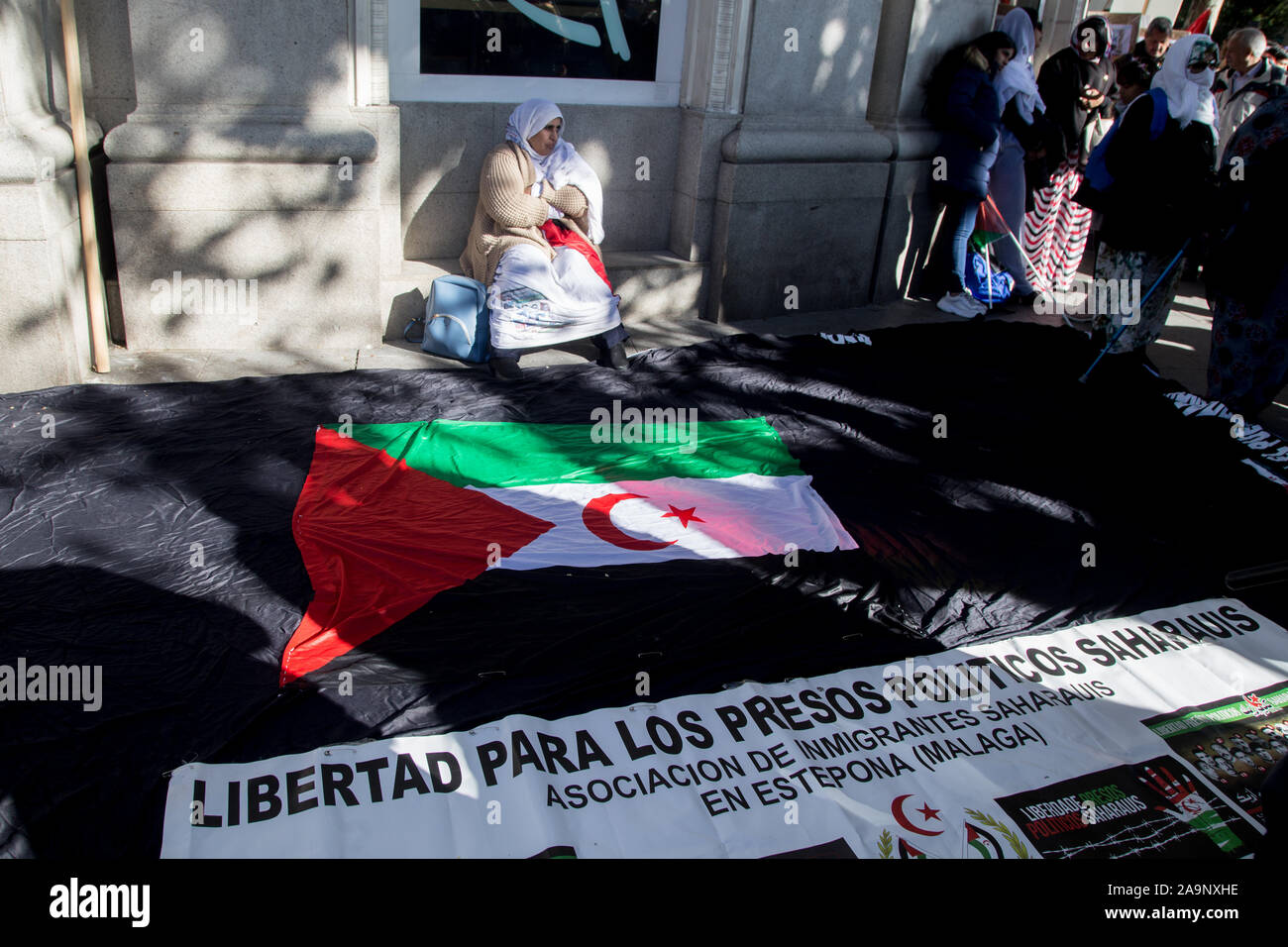 Madrid, Spain. 16th Nov, 2019. Saharawi flag laying on the ground during the demonstration.Thousands of Saharawis arrive from all over Spain to demand the end of Morocco's occupation in Western Sahara, the freedom of political prisoners, in support of the Polisario Front and to demand solutions from the Spanish government. Western Sahara was a Spanish colony until 1976 where Spain left the territory. Later Morocco occupied part of Western Sahara and still part of the Saharawi population lives in refugee camps in the desert in Algeria and in Spain. Credit: SOPA Images Limited/Alamy Live News Stock Photo