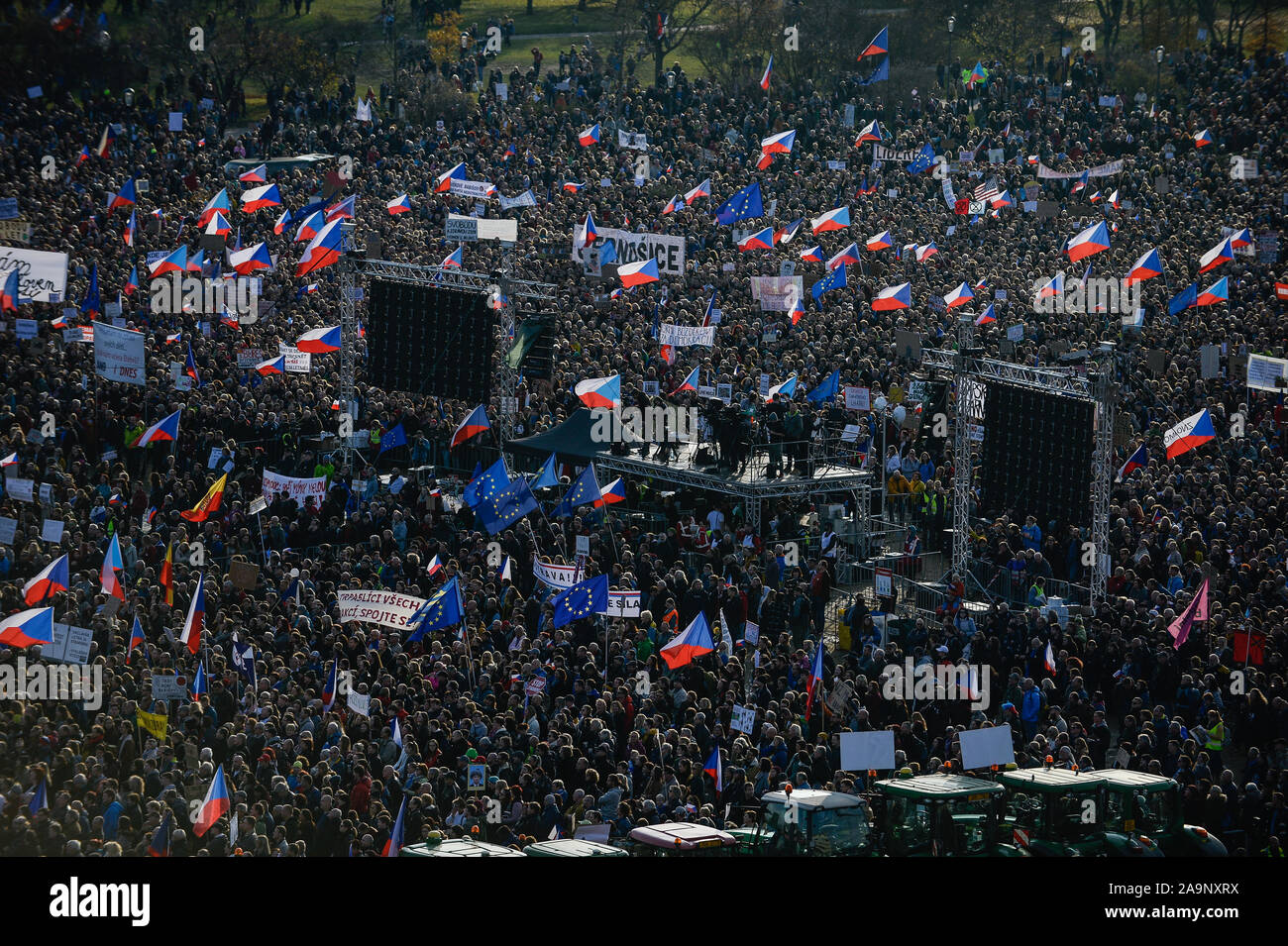 Prague, Czech Republic. 16th Nov, 2019. Crowd of protesters with flags, banners and placards during the demonstration.A day before the official celebrations of the 30th Anniversary of Velvet Revolution thousands protest demanding the resignation of Czech Republic's Prime Minister, Andrej Babis. The Million Moments for Democracy (organisers) set an ultimatum for the PM, Andrej Babis asking him to either remove his conflict of interest; get rid of the Agrofert firm and dismiss the Justice Minister, Marie Benesova or resign himself. Credit: SOPA Images Limited/Alamy Live News Stock Photo