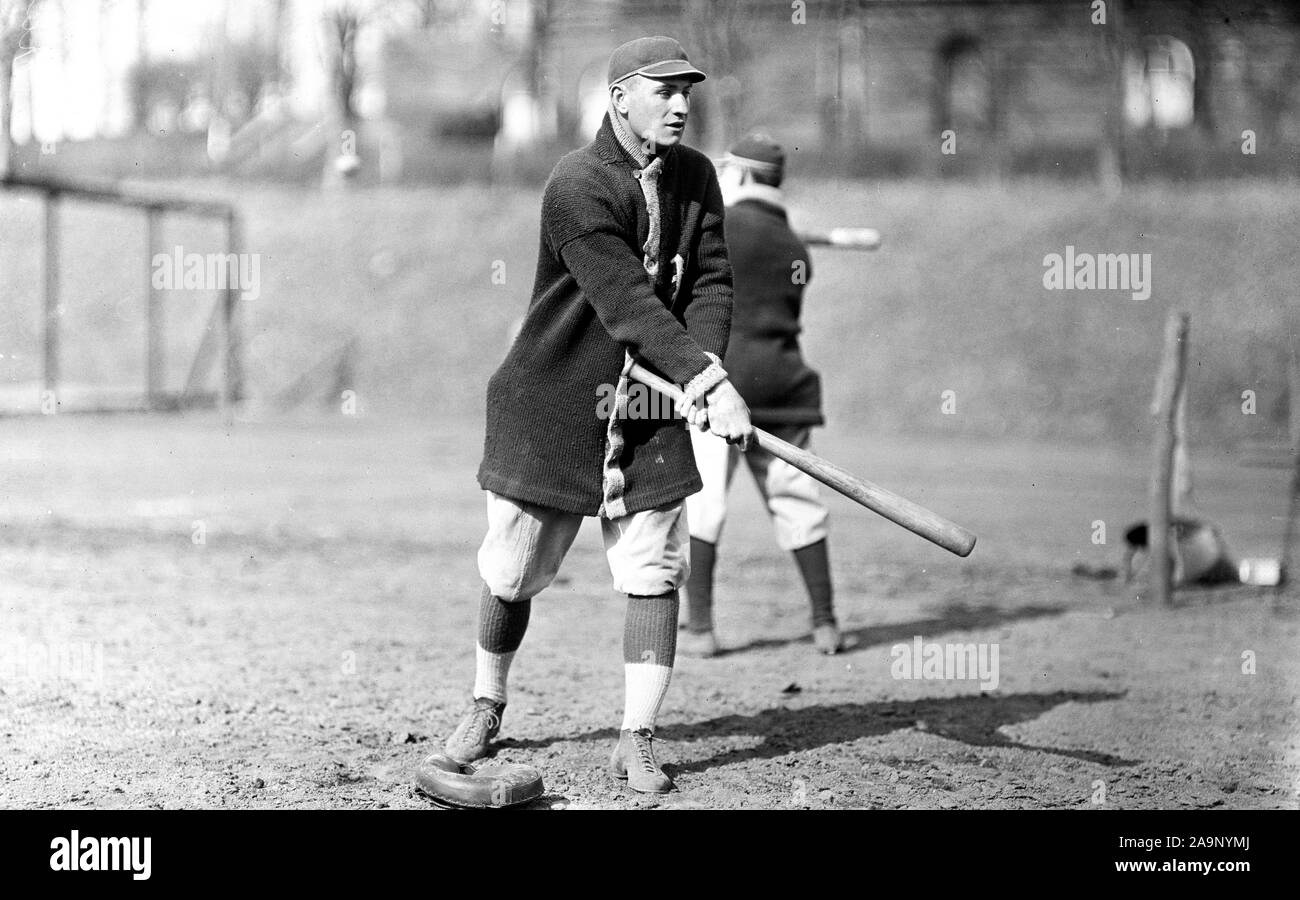 Early 1900s Photos - Vintage baseball player swinging baseball bat ca. 1913-1917 Stock Photo