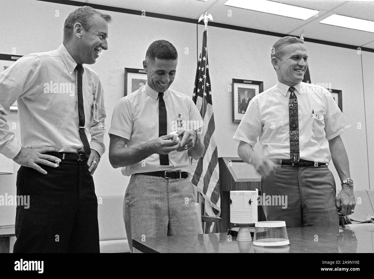 (18 Oct. 1968) --- The prime crew of the Apollo 8 mission is photographed in Building 4, at the Manned Spacecraft Center (MSC), where they are participating in classroom work in burn test review and procedures review. Left to right, are astronauts James A. Lovell Jr., William A. Anders, and Frank Borman. Stock Photo