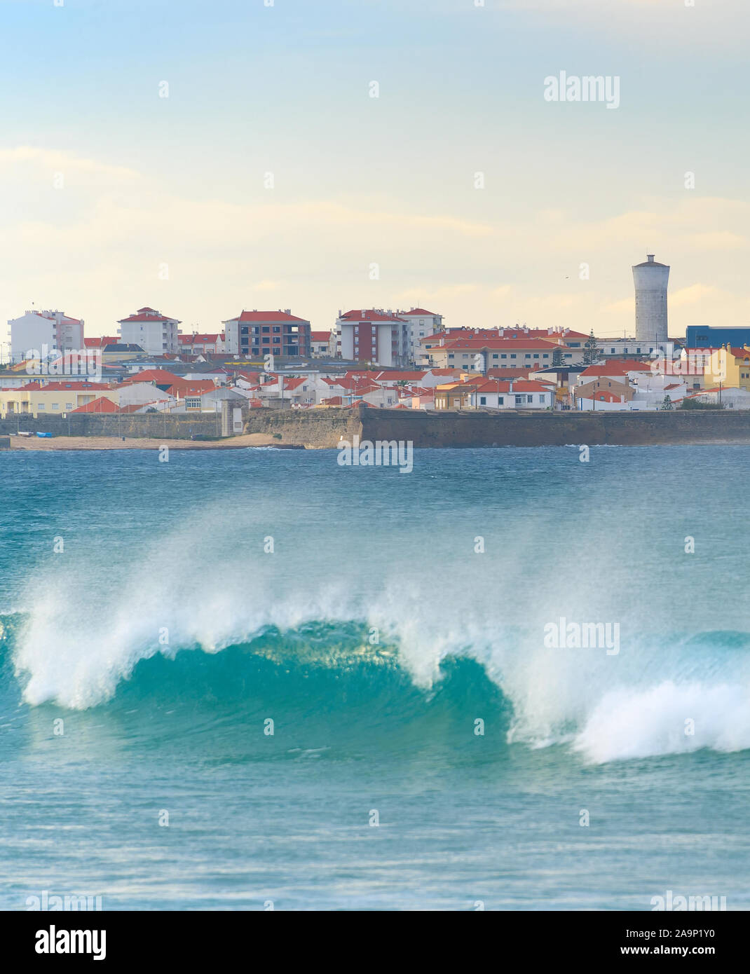 Cityscape of Peniche - coastal town in Portugal. Atlantic ocean in the foreground Stock Photo
