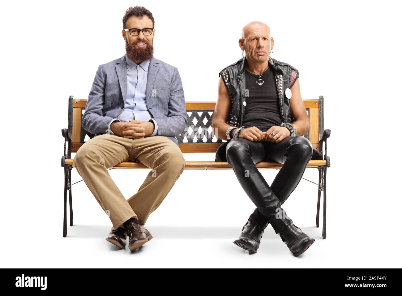 Full length portrait of a smiling bearded man and a grumpy punker sitting on a bench isolated on white background Stock Photo