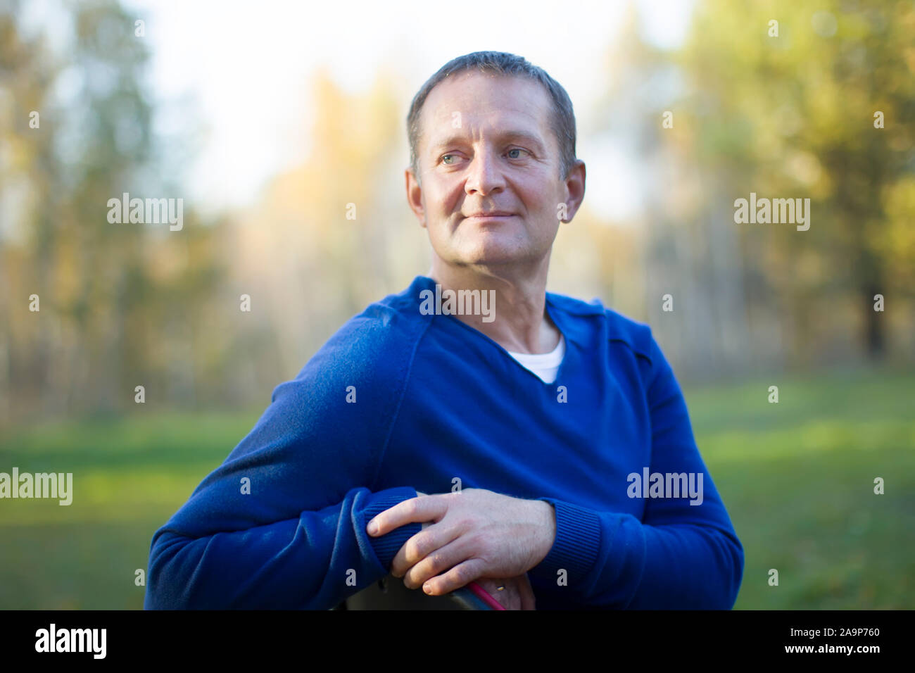 Portrait of a handsome elderly man outdoors Stock Photo