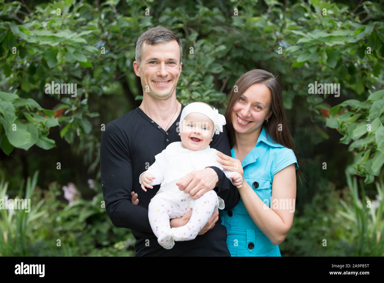 mom dad and baby