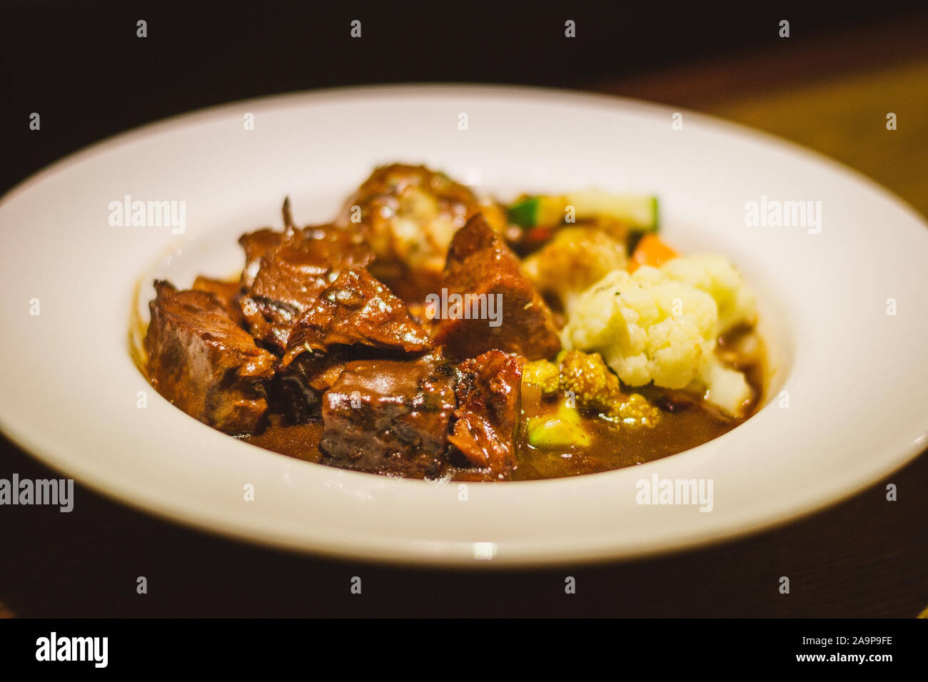 Munich Braised Beef SlowCooked Braised Beef in Red Wine Gravy Served