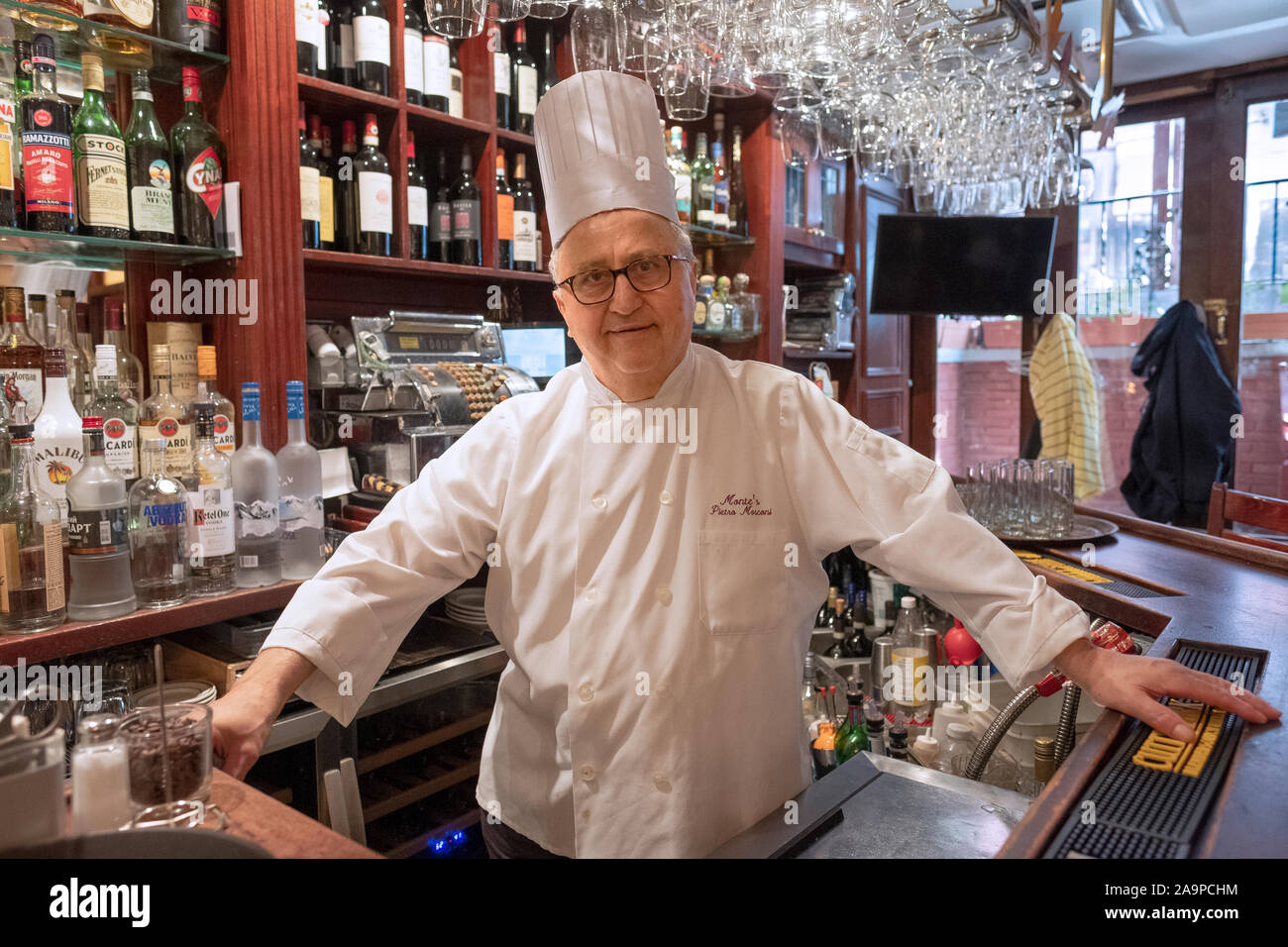 A  posed portrait of Chef Pietro Mosconi, the owner of Monte's, a family restaurant on Macdougal Street in Greenwich Village since 1976. Stock Photo