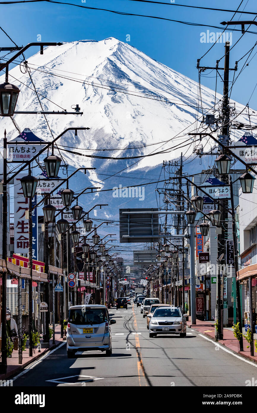 Street with electricity cables in front of mount Fuji, Japan Stock Photo