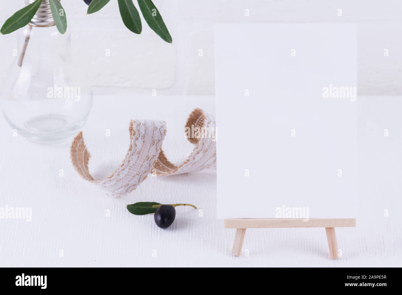 Download Festive Wedding Birthday Or Business Table Setting And Mock Up Invitation With Olive Branch On White Background Blank Card Mockup Stock Photo Alamy