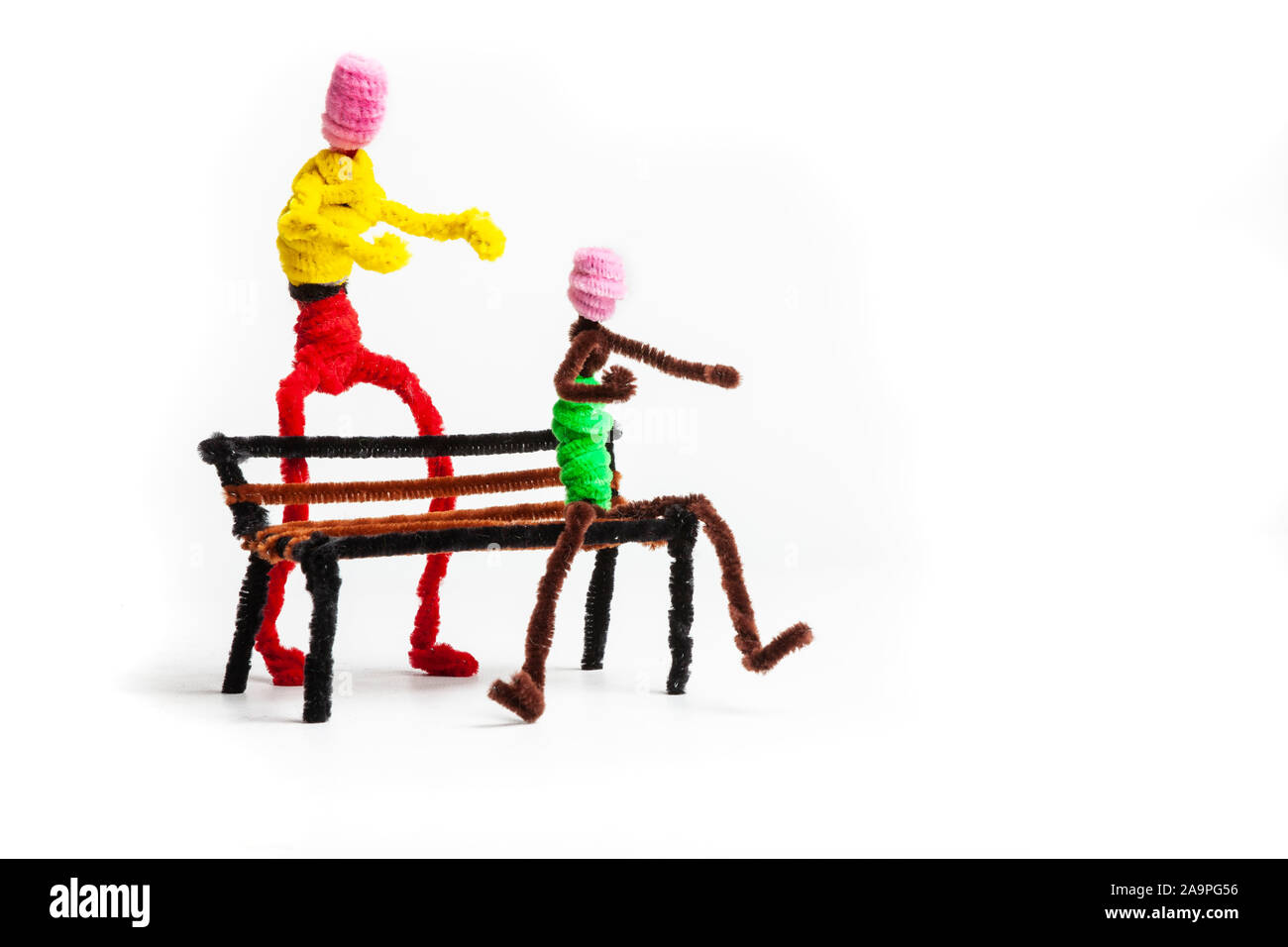 Pipe cleaner figures against a white background Stock Photo Alamy