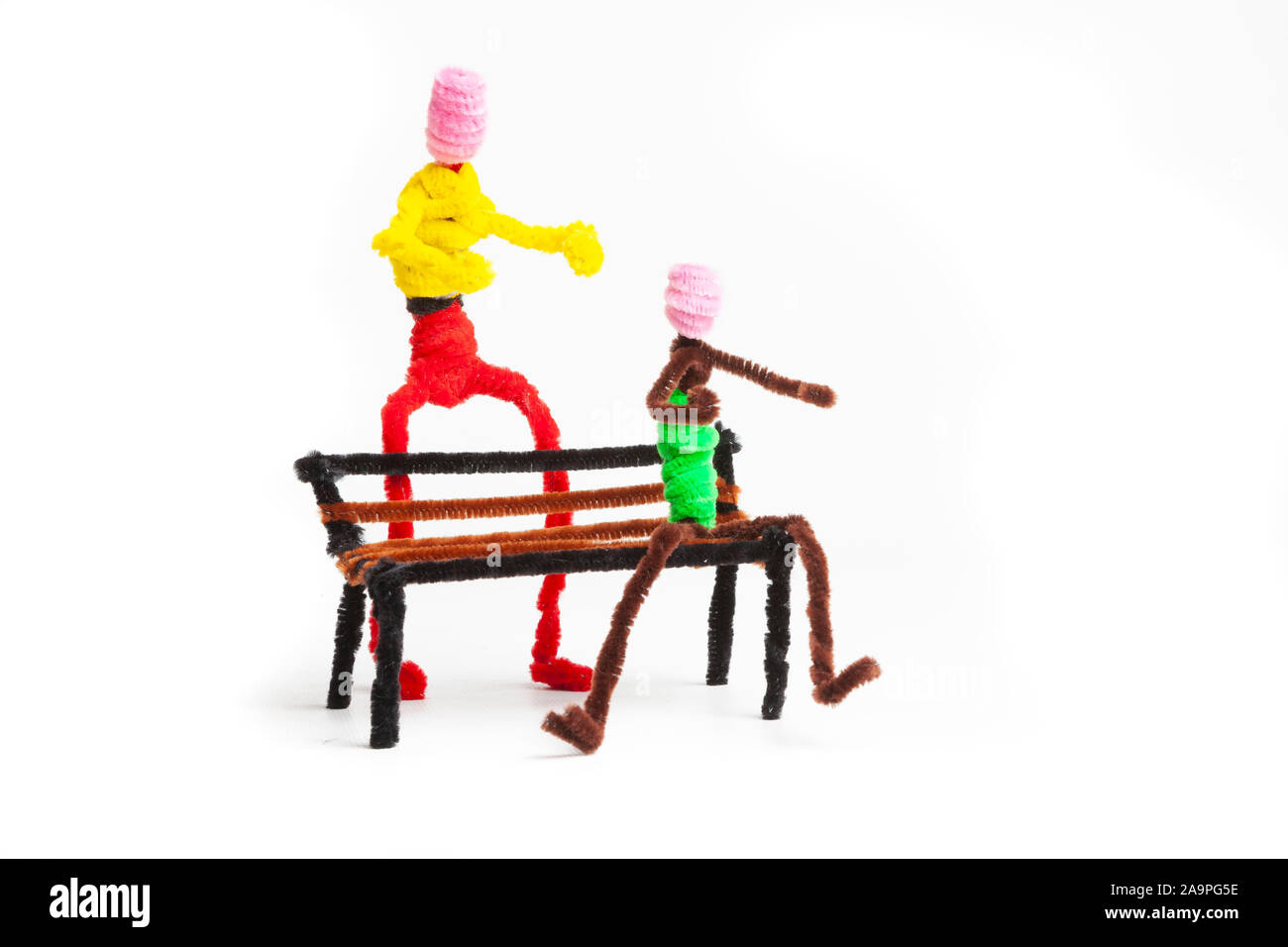 Pipe cleaner figures against a white background Stock Photo Alamy
