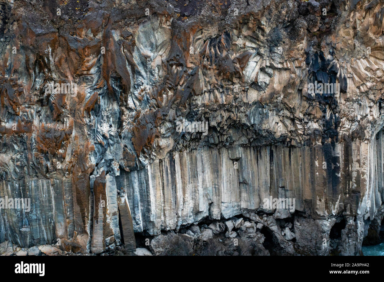 details of columnar basalt of Aldeyjarfoss Waterfall in a seculed area of the highland Stock Photo
