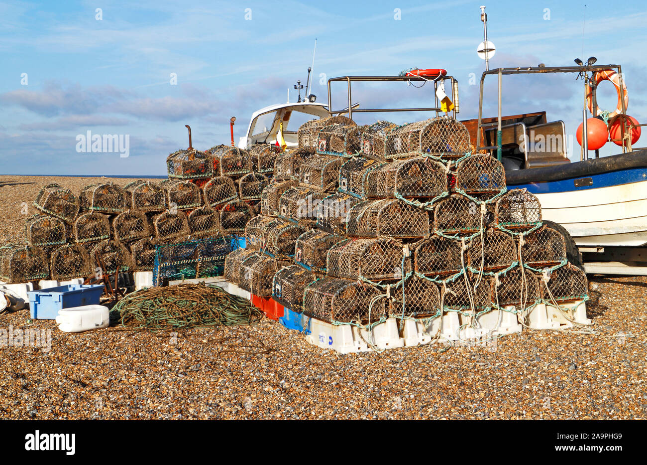 Stacks of crab pots stored by inshore fishing boats on the North