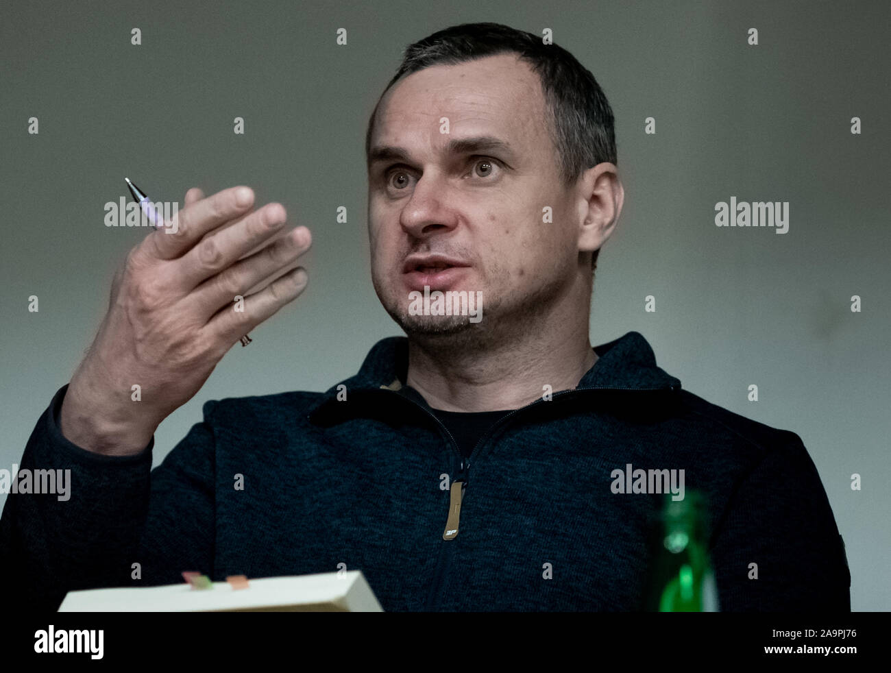 London, UK. 16th November, 2019. Oleg Sentsov speaks and signs copies of his book 'The Marketeer' at the Ukrainian Cultural Centre. Sentsov is a Ukrainian filmmaker, writer and activist from Crimea. Following the Russian annexation of Crimea in 2014 he was arrested in Crimea and sentenced to 20 years' imprisonment by a Russian court on charges of plotting terrorism acts. The conviction was described as fabricated by Amnesty International and others. He was awarded the European Parliament’s Sakharov Prize in 2018. He was released in a prisoner swap. Credit: Guy Corbishley/Alamy Live News Stock Photo