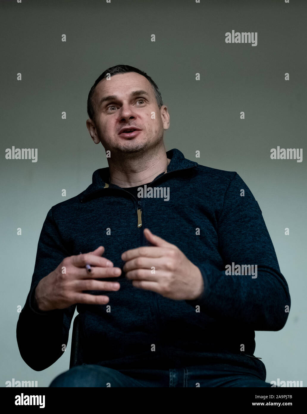 London, UK. 16th November, 2019. Oleg Sentsov speaks and signs copies of his book 'The Marketeer' at the Ukrainian Cultural Centre. Sentsov is a Ukrainian filmmaker, writer and activist from Crimea. Following the Russian annexation of Crimea in 2014 he was arrested in Crimea and sentenced to 20 years' imprisonment by a Russian court on charges of plotting terrorism acts. The conviction was described as fabricated by Amnesty International and others. He was awarded the European Parliament’s Sakharov Prize in 2018. He was released in a prisoner swap. Credit: Guy Corbishley/Alamy Live News Stock Photo