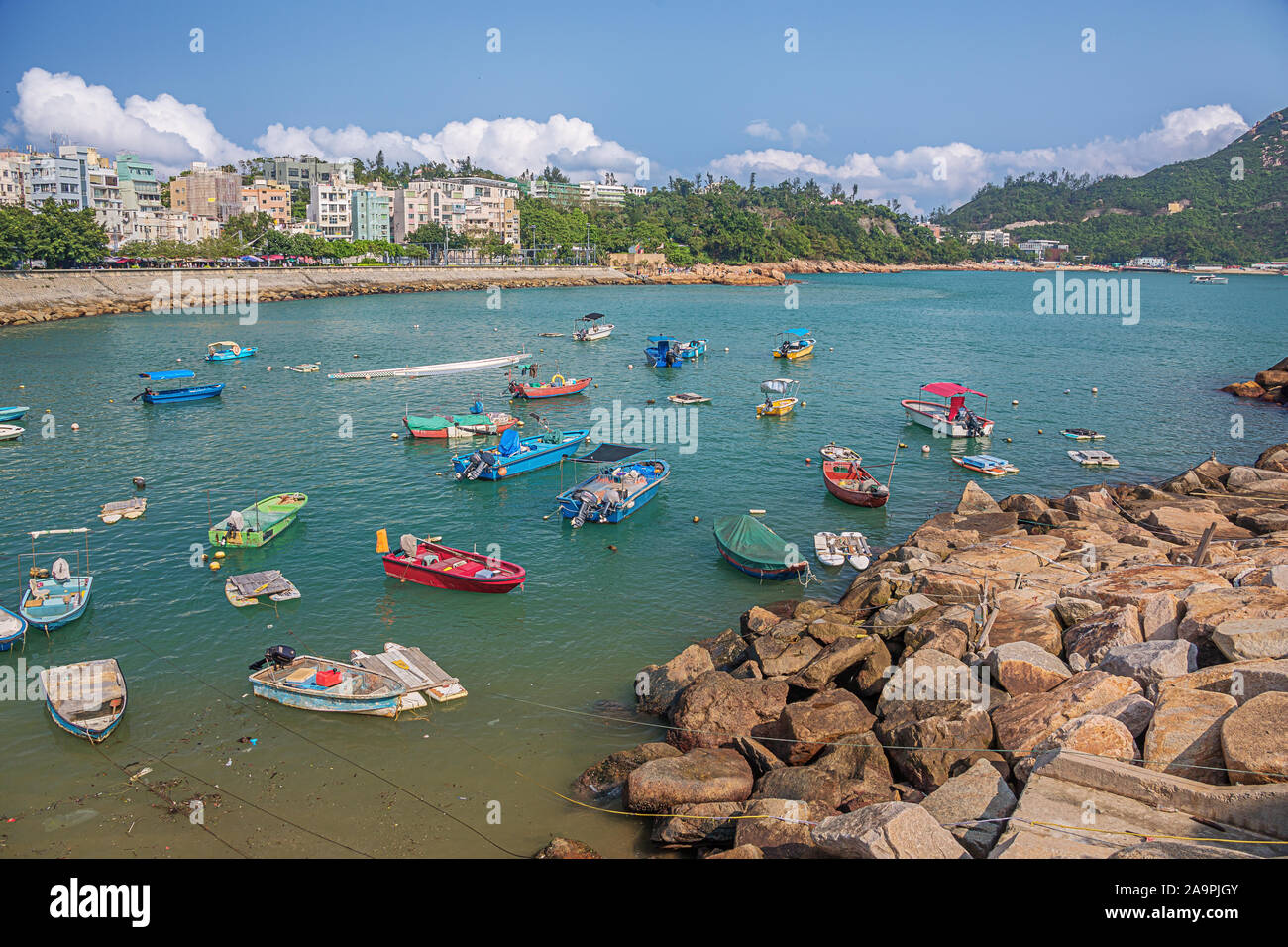 Editorial: HONG KONG, CHINA, April 22, 2019 - Small boats moored at the jetty in Repulse Bay in Hong Kong Stock Photo