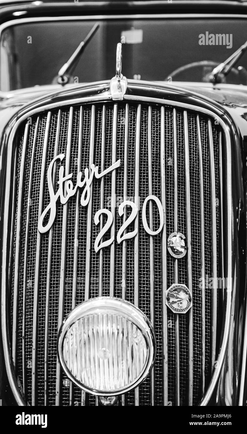 Vienna, Austria 10.01.2015 : Closeup of grill Black Steyr 220 classic car from 1937. Black and white foto of Museum of Technology exhibit. Place to Stock Photo