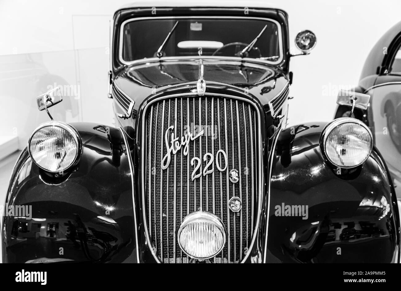 Vienna, Austria 10.01.2015 : Black Steyr 220 classic car from 1937. Black and white foto of Museum of Technology exhibit. Place to visit. Stock Photo