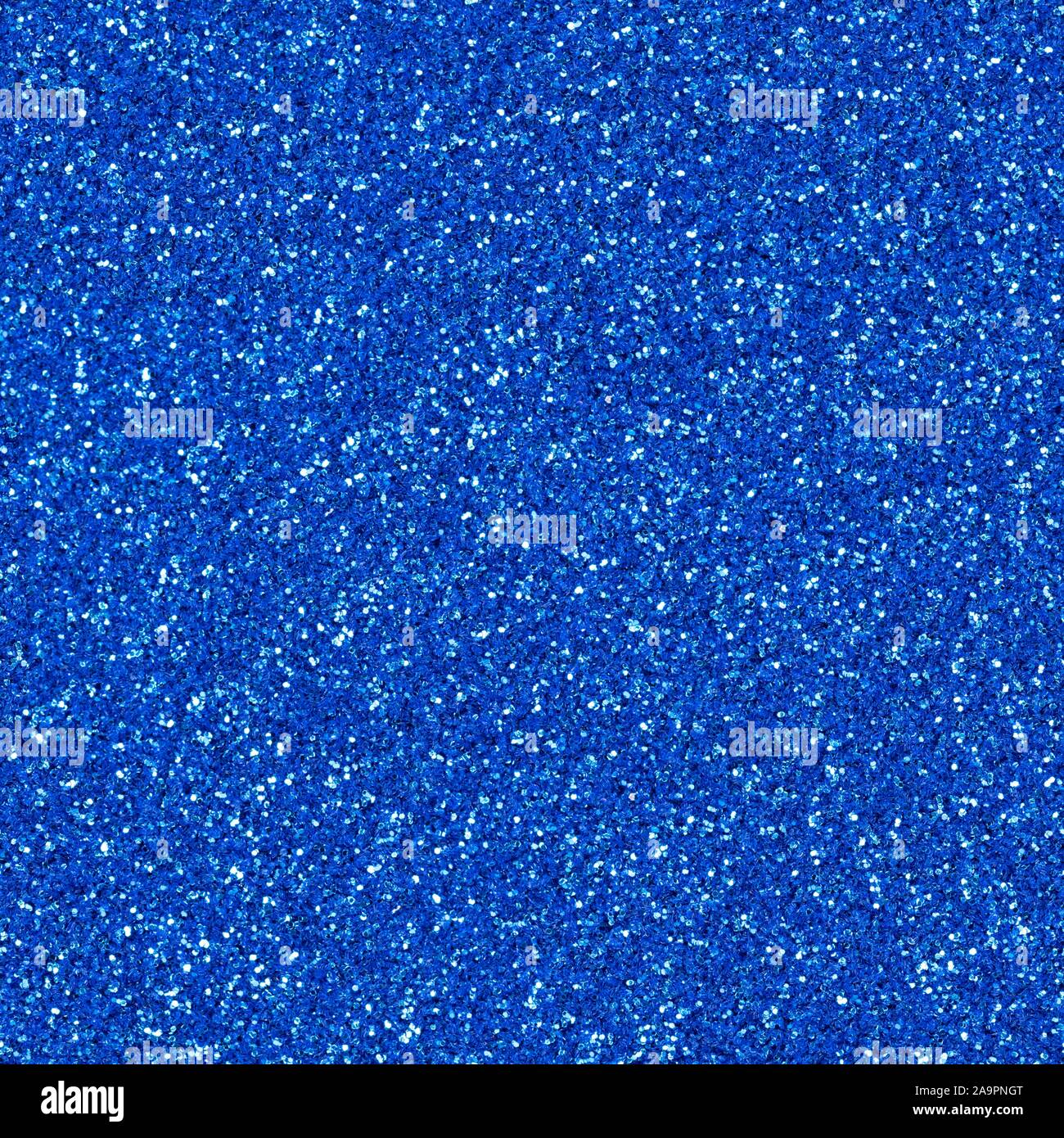 Light blue shiny glitter, sparkle confetti texture. Christmas abstract