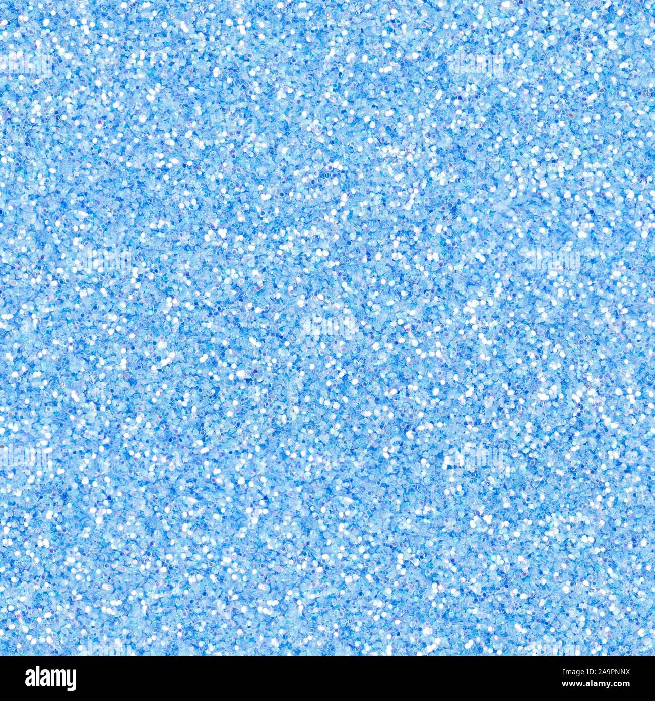 Bright light blue glitter, sparkle confetti texture. Christmas abstract background, seamless pattern Stock Photo