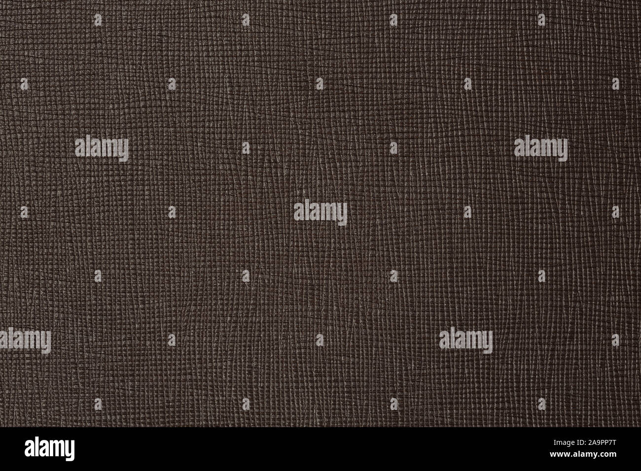 Texture of dark brown leather on macro. Stock Photo