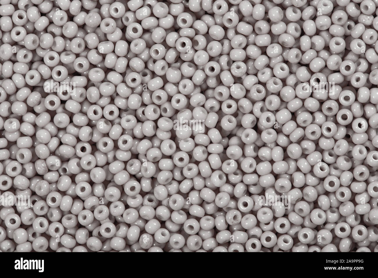 Many grey glass beads, background. High quality texture Stock Photo Alamy
