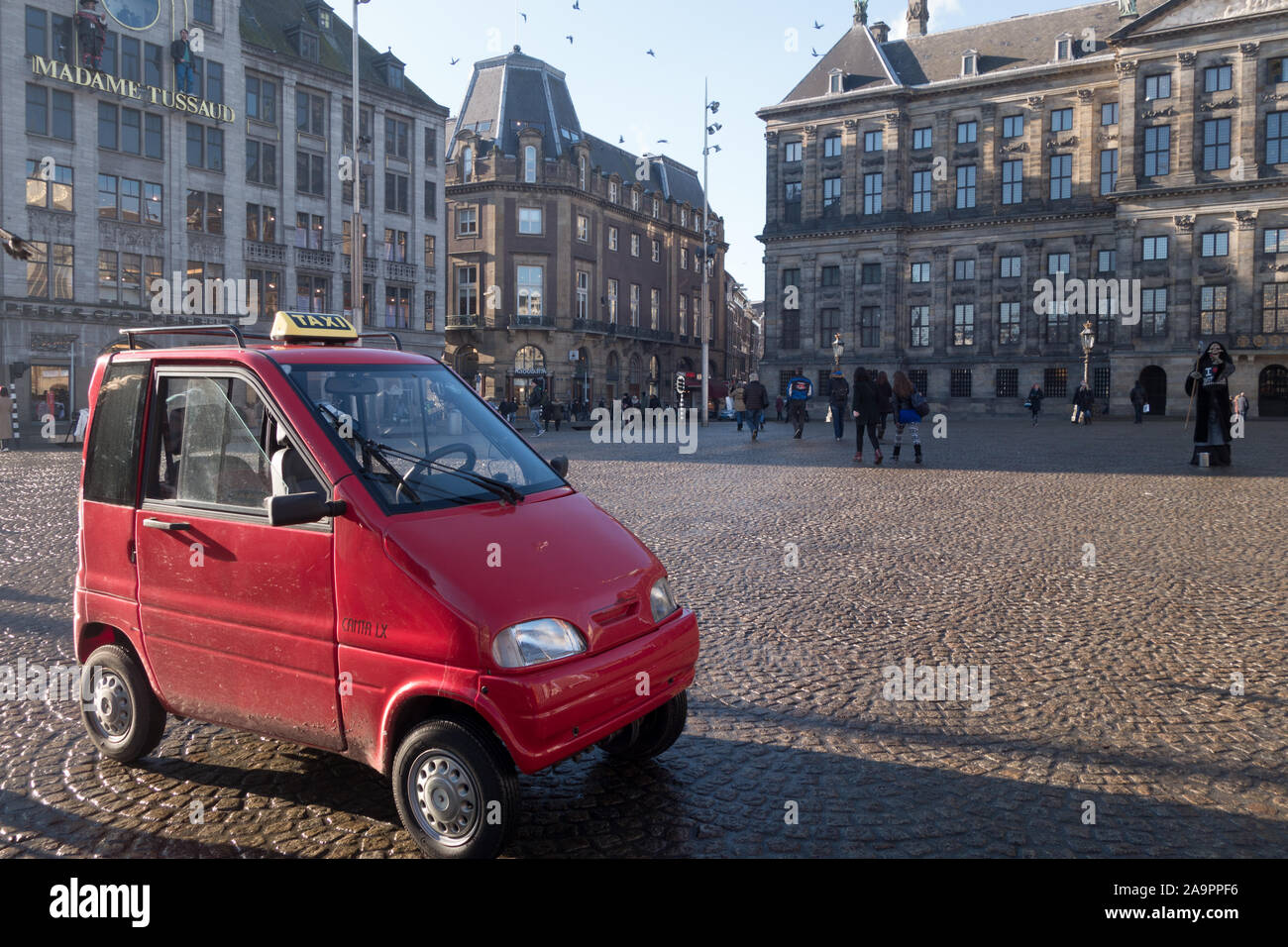 Canta mini taxi in Dam Square Amsterdam Stock Photo