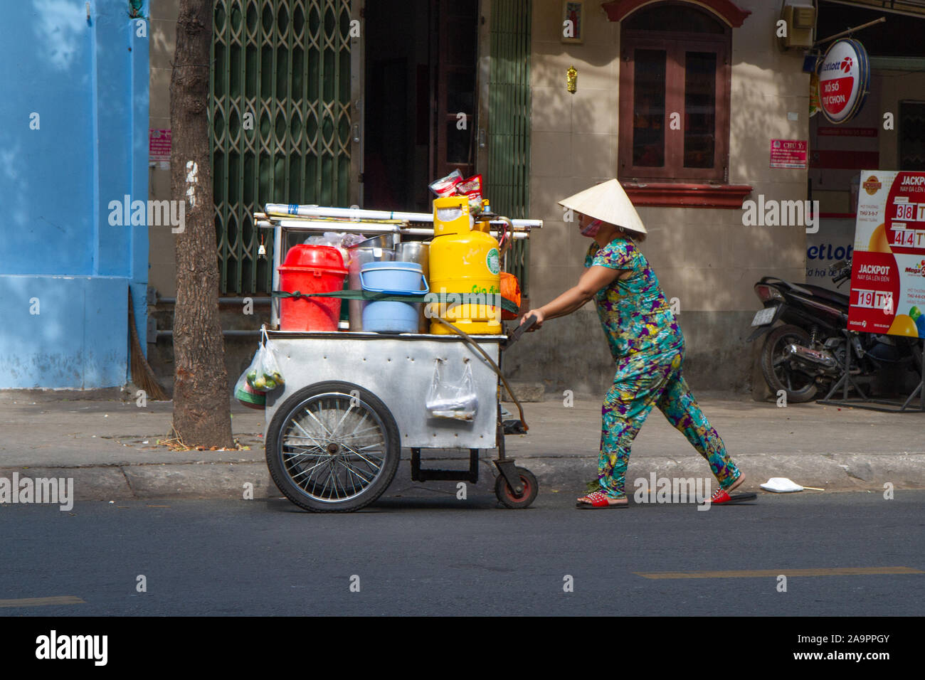 Typical street scene Saigon, Ho Chi Minh City Vietnam Stock Photo
