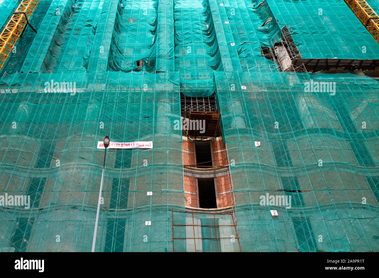 Scaffolding of a building site of a Large hotel development in Ho chi Minh Vietnam Stock Photo