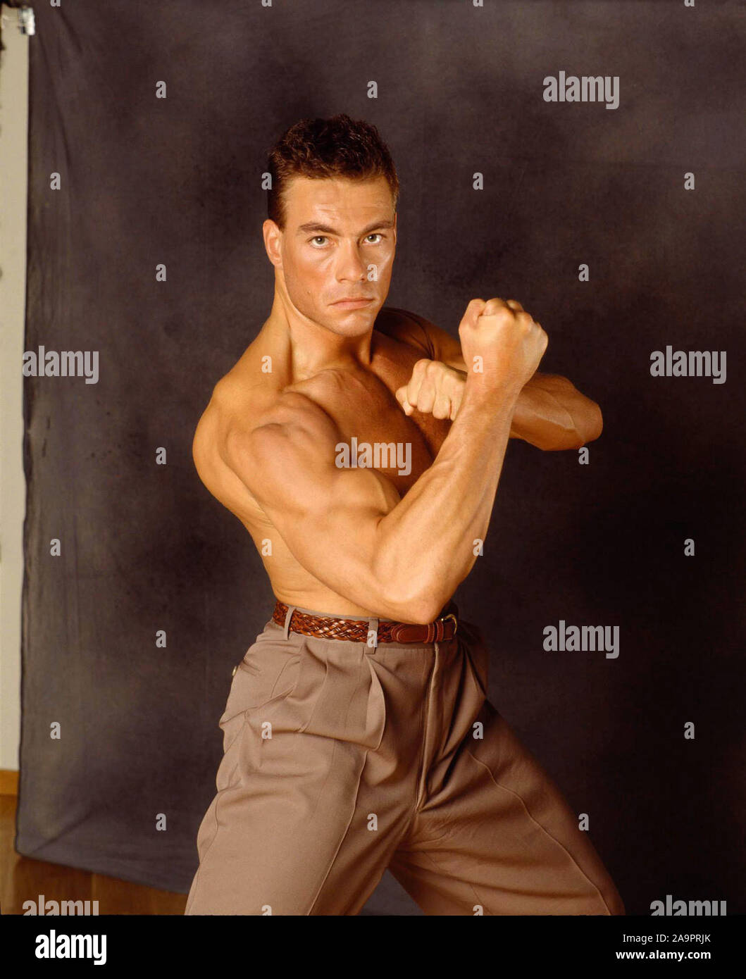 JEAN-CLAUDE VAN DAMME in DOUBLE IMPACT (1991), directed by SHELDON LETTICH.  Credit: STONE GROUP PICTURES/COLUMBIA TRI-STAR / Album Stock Photo - Alamy