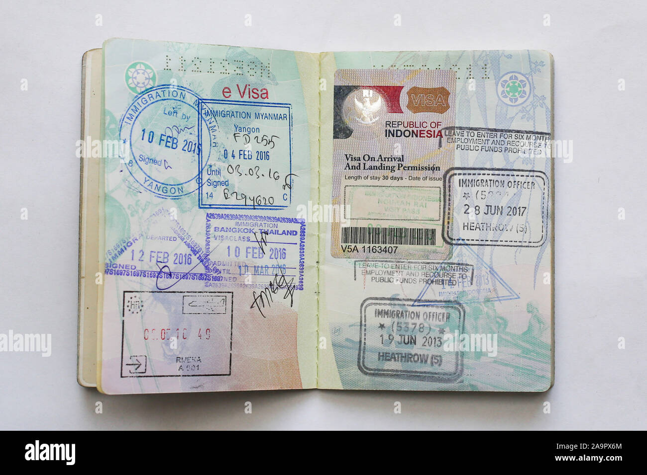 Open pages of Australian passport with visa stamps Stock Photo