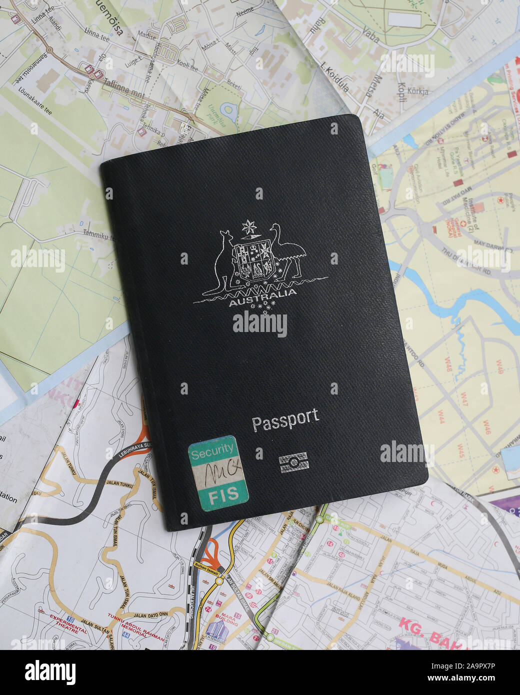 Australian Passport on travel maps Stock Photo