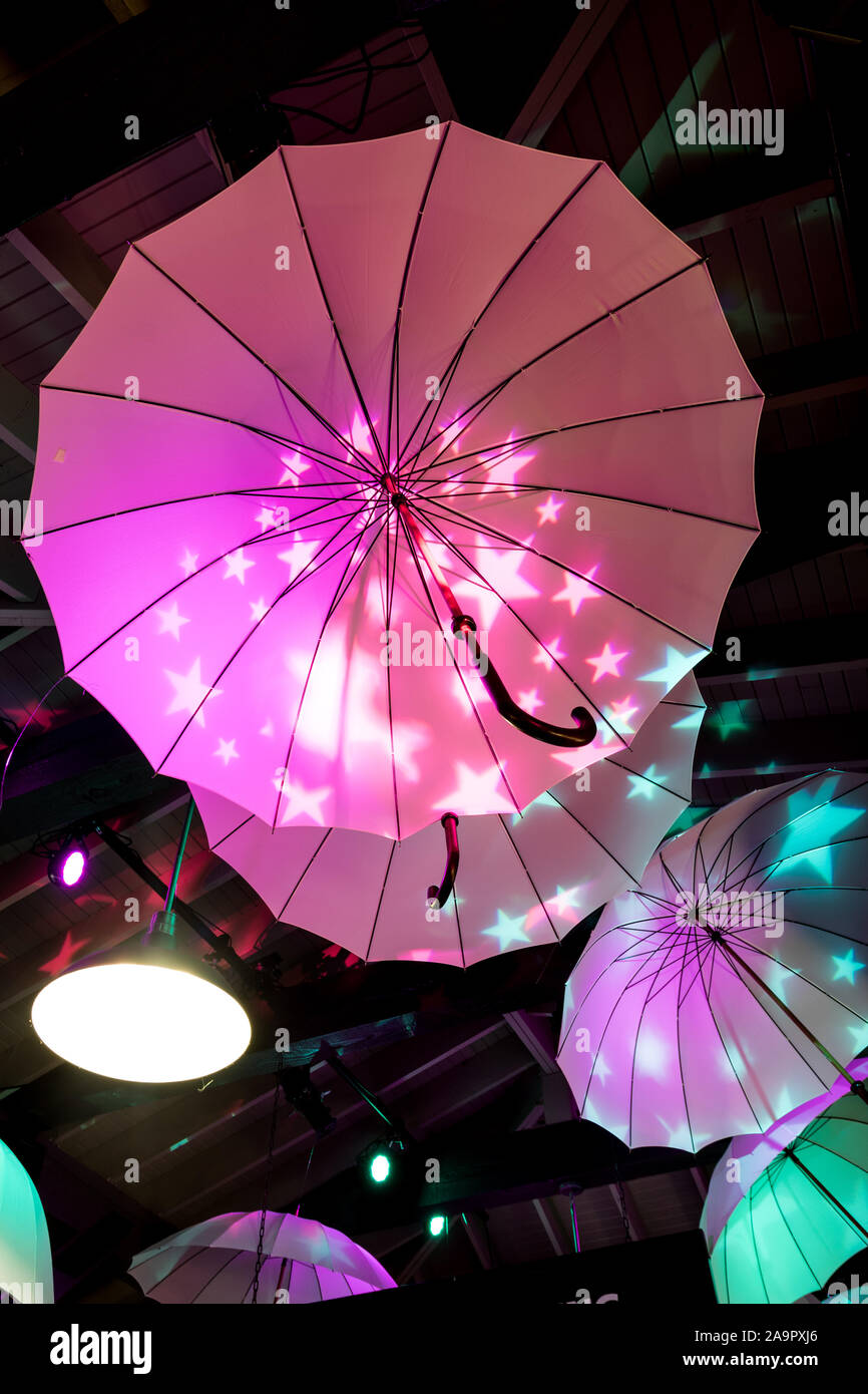 Colorful Umbrellas Hanging Under The Ceiling Light Up With Bright