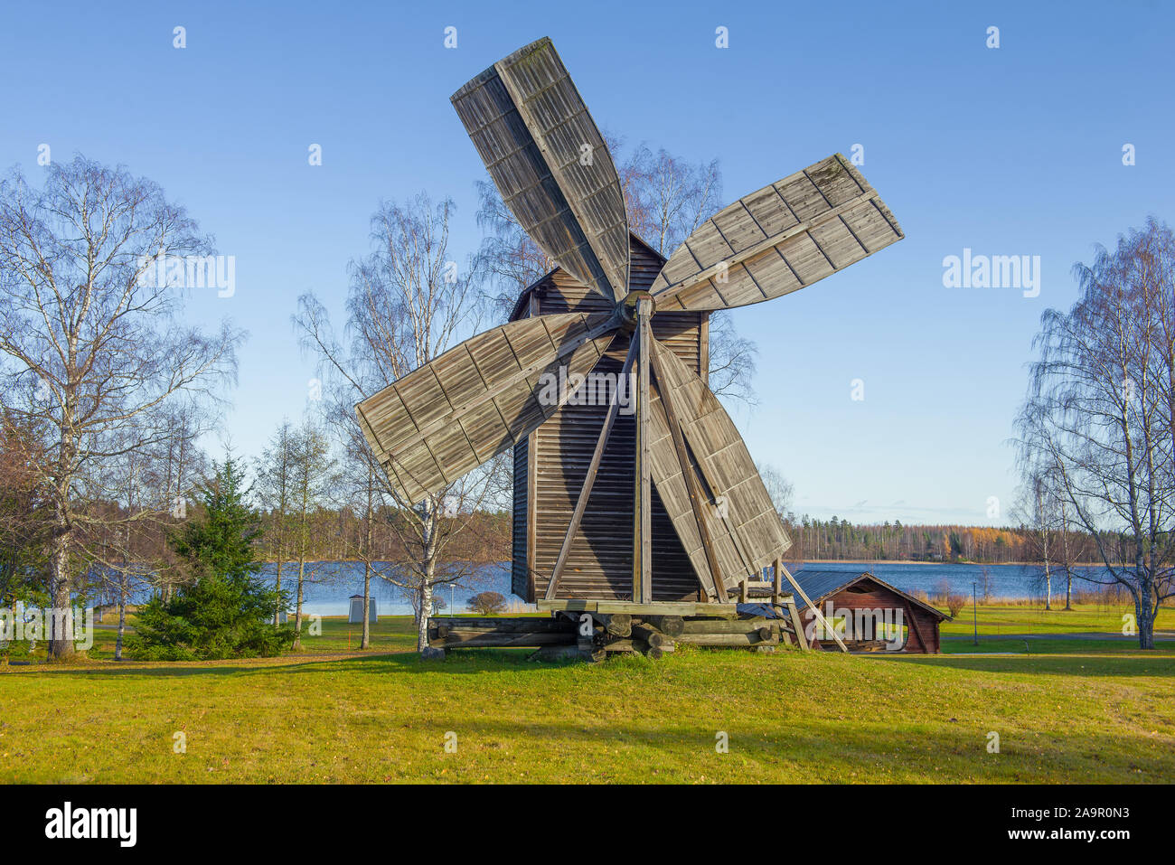 Old wooden mill on a sunny October day. Rantasalmi, Finland Stock Photo