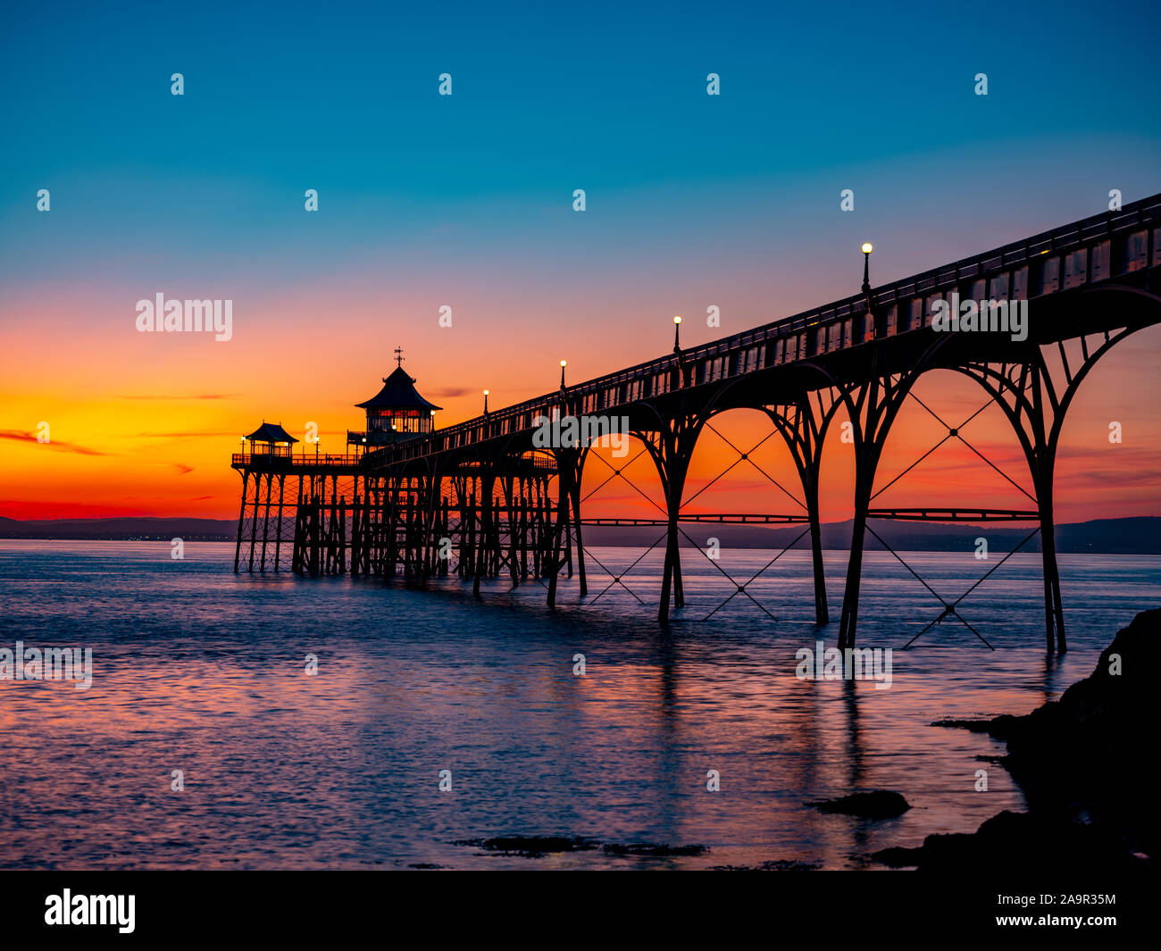 Sunset photo of Clevedon Pier on the River Severn estuary, near to Bristol, Somerset, England, UK. Stock Photo