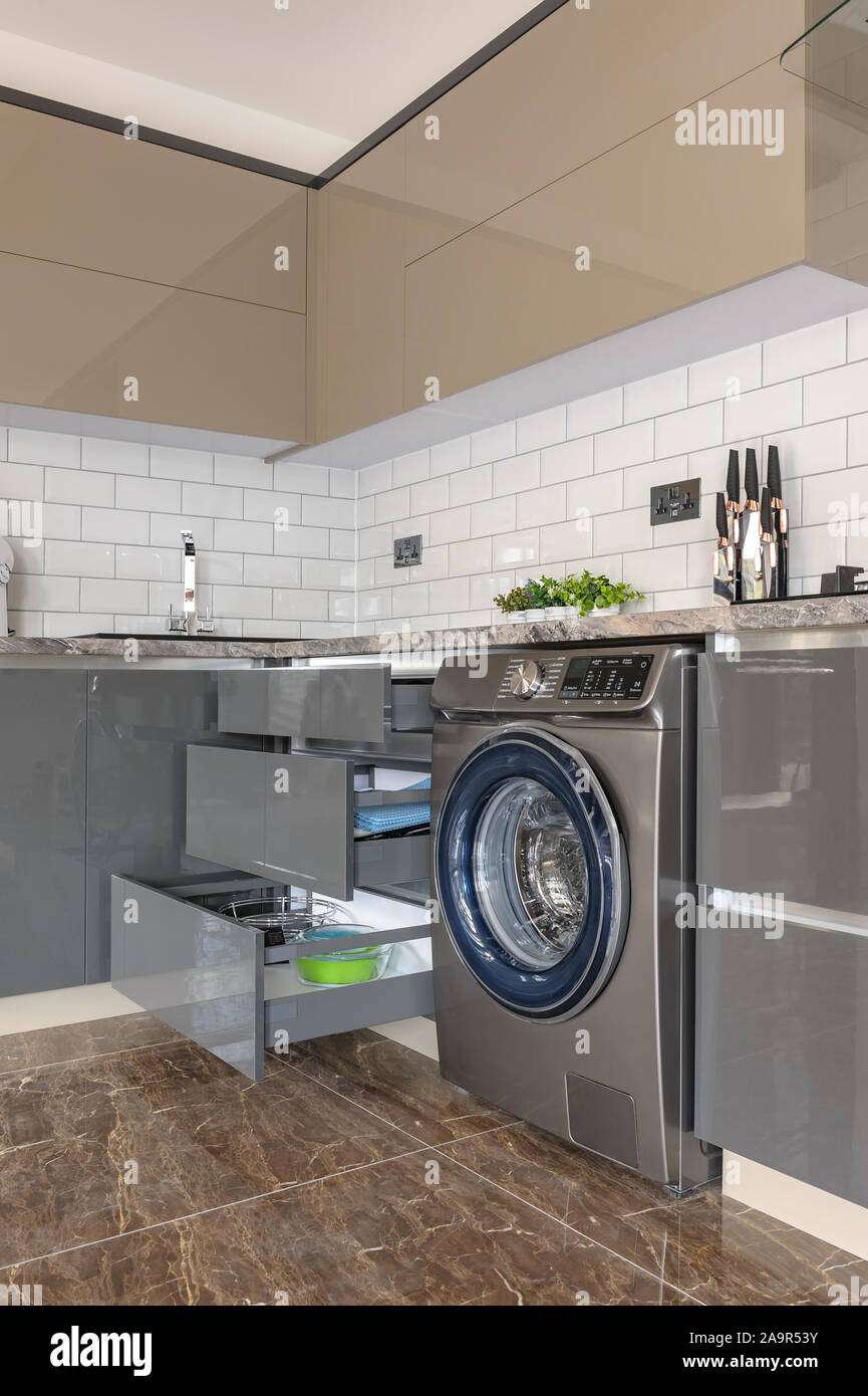 Luxury modern white, beige and grey kitchen interior Stock Photo - Alamy