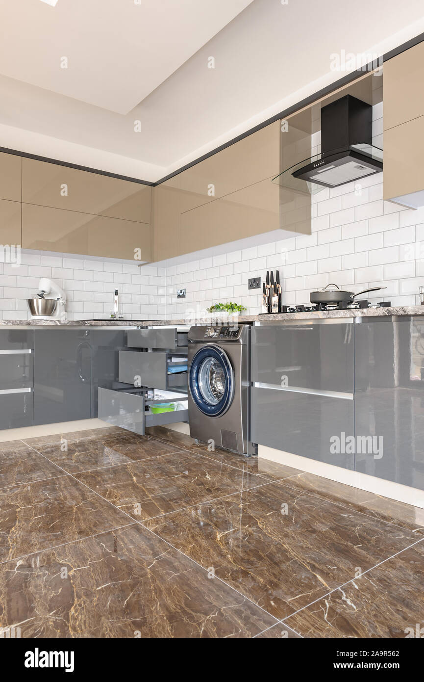 Luxury modern white, beige and grey kitchen interior Stock Photo - Alamy