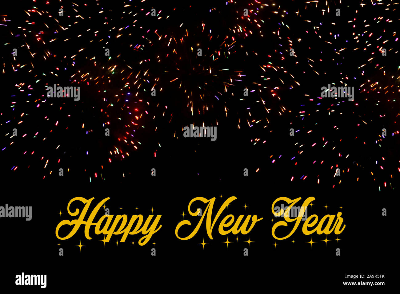 Happy new year in golden letters on a black background with colored ...