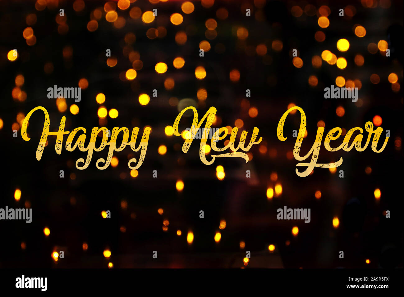 Happy new year in golden letters on a black background with golden ...