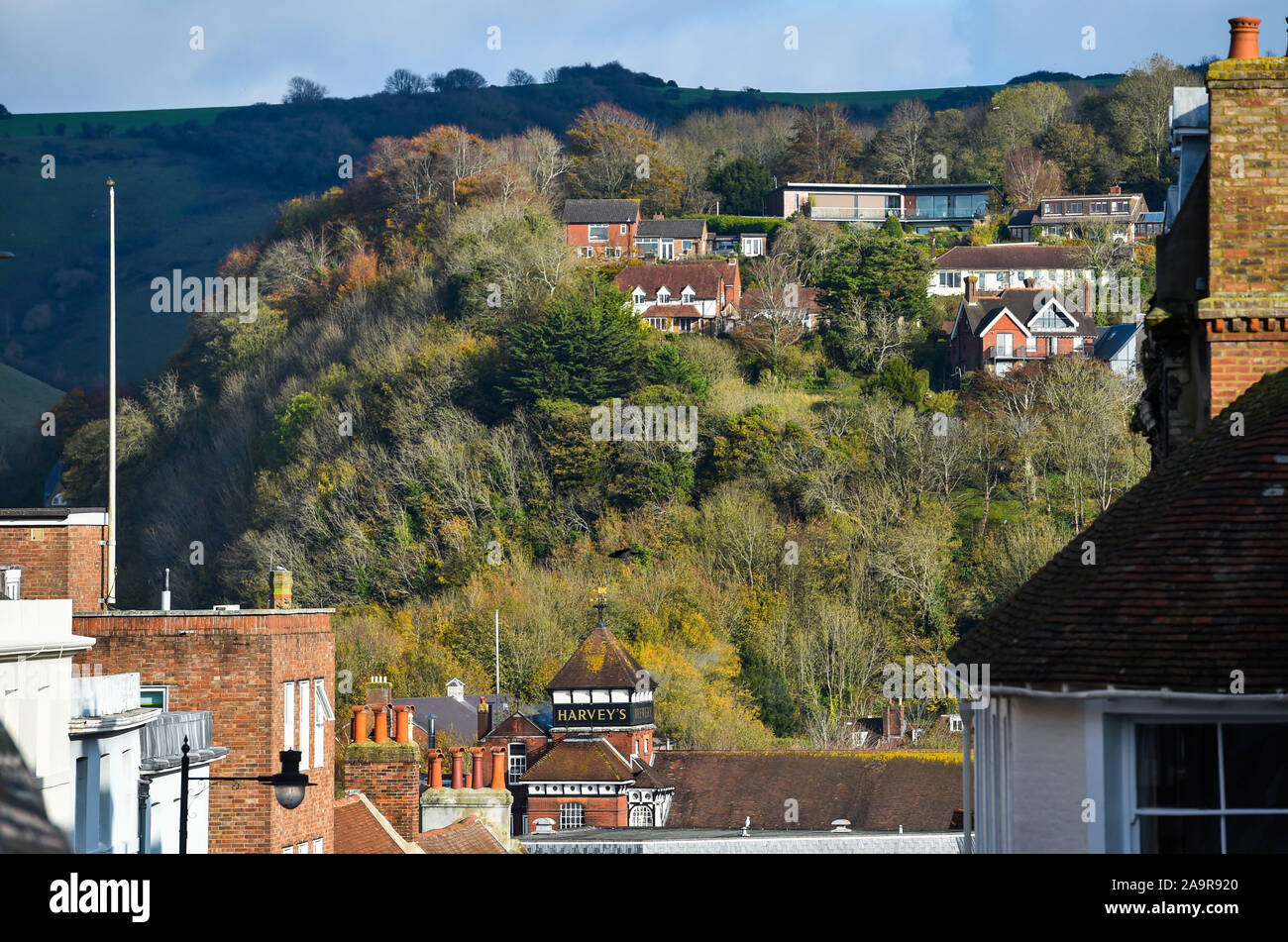View from Lewes High Street to houses overlooking the market town and Harveys Brewery UK Stock Photo