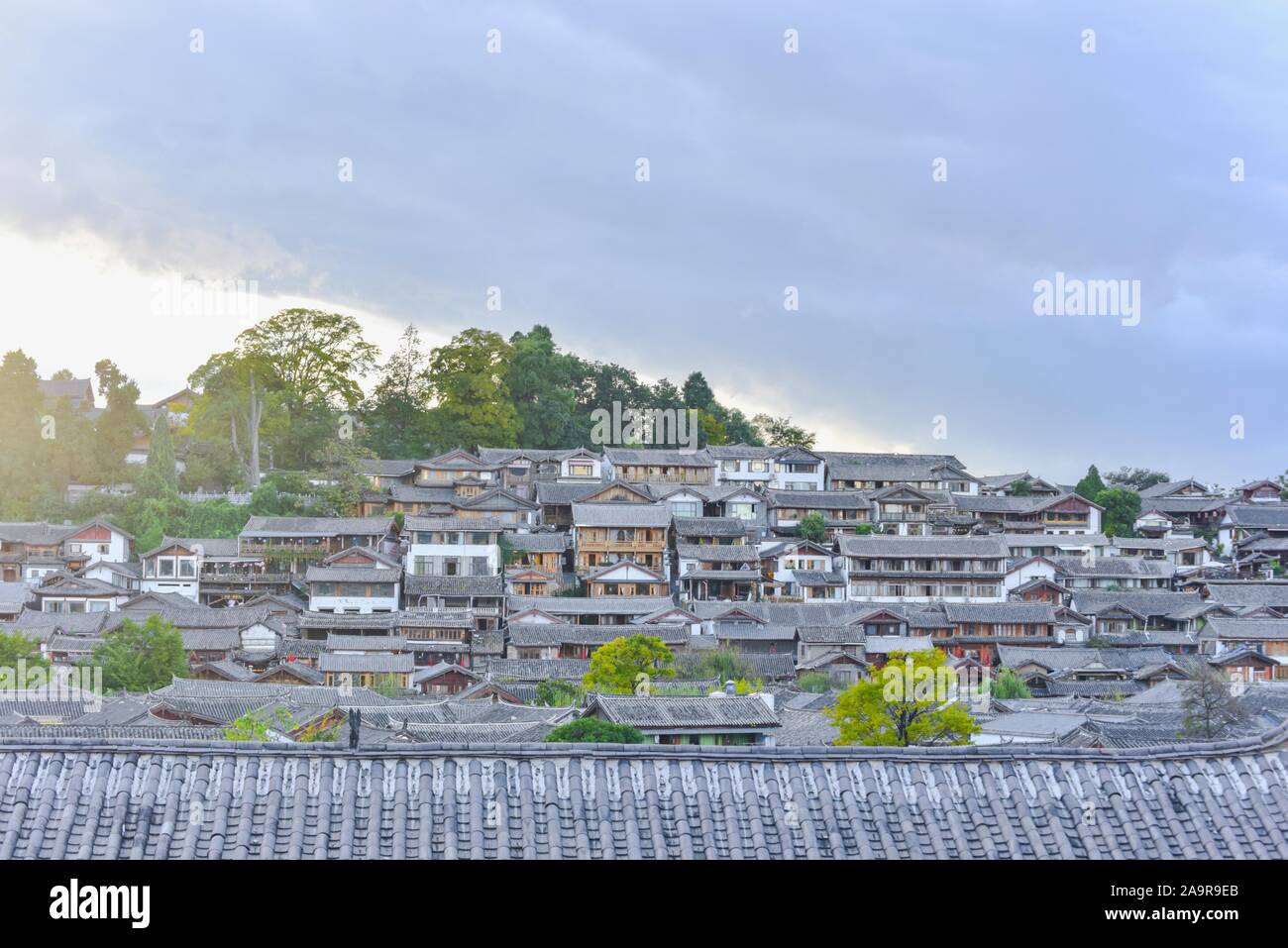 View of Lijiang Ancient Town During Sunset in China Stock Photo