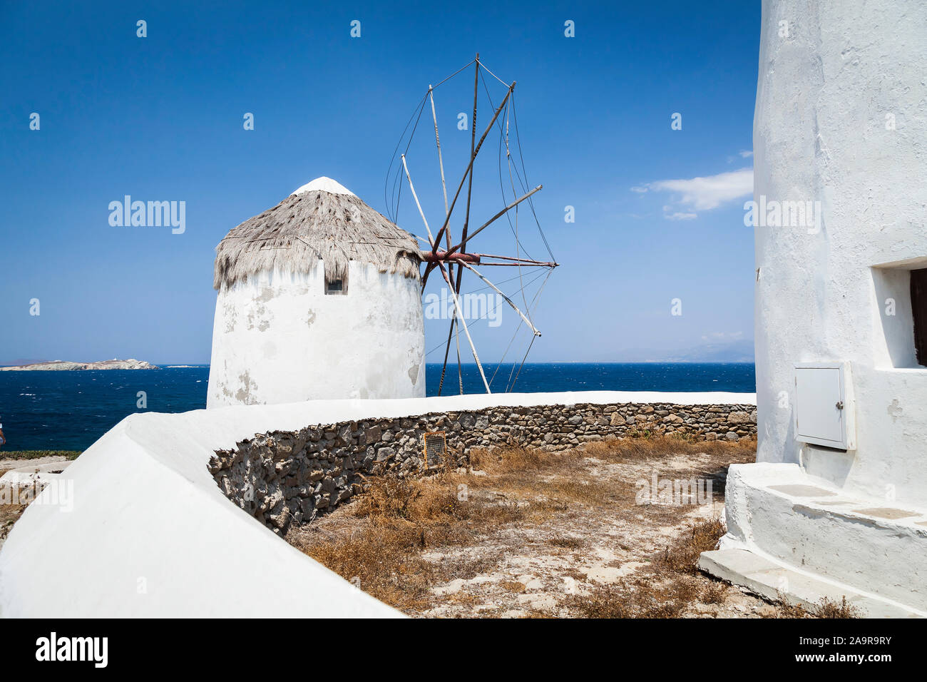 Eine schoene Windmuehle auf Santorini in Griechenland Stock Photo
