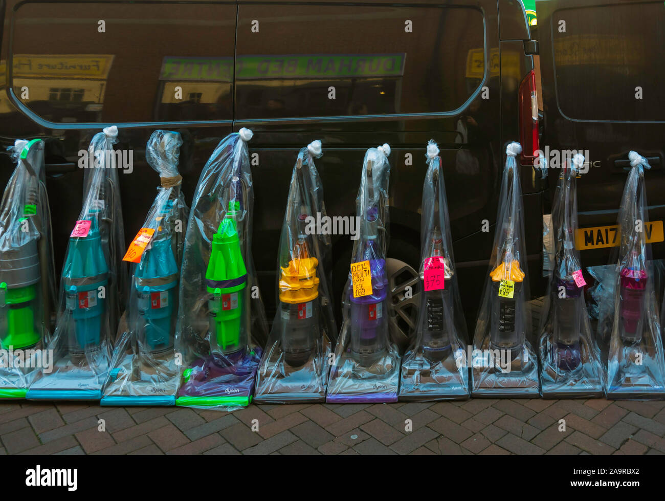 A line up of refurbished Dyson Vacuum cleaners for sale in a weekly