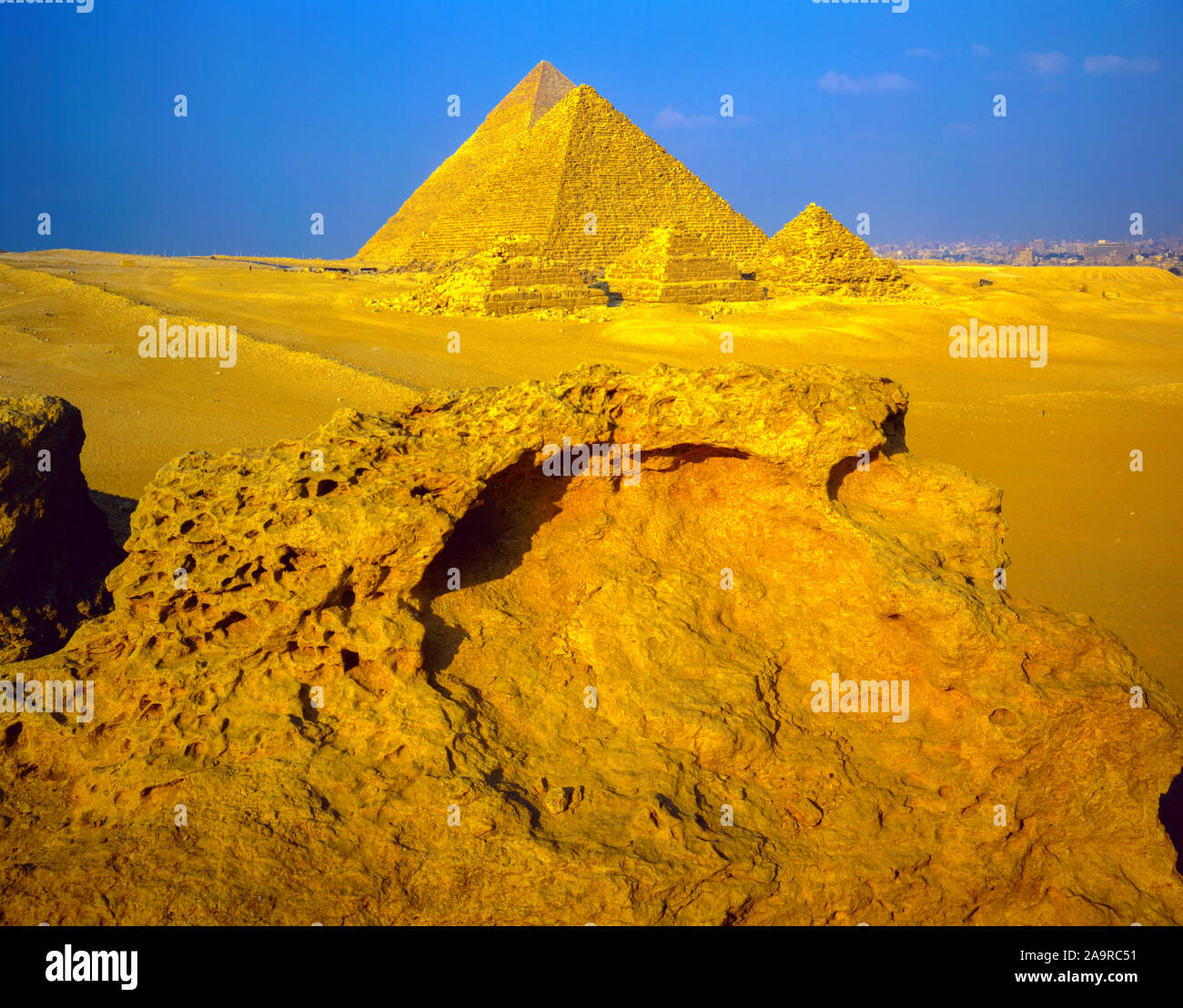 Giza pyramids, Giza Plateau, Egypt, Sahara Desert with Cairo, Egypt beyond, From 2,500 BC Stock Photo