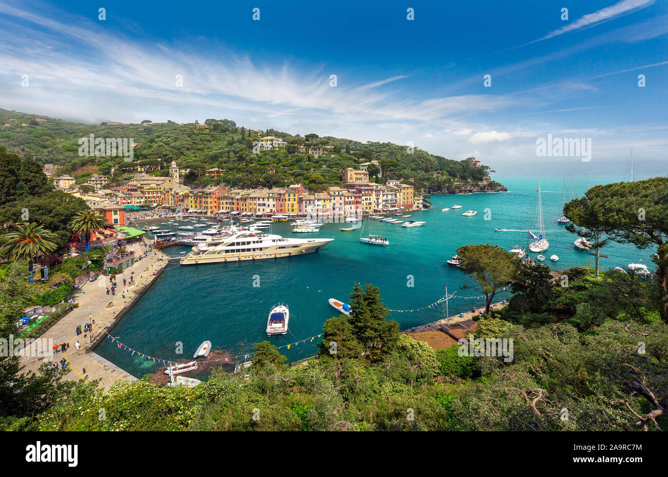 Aerial panoramic view of Portofino, the colorful coastal italian village in the province of Liguria, Italy - Multicolored houses and villas, fishing b Stock Photo