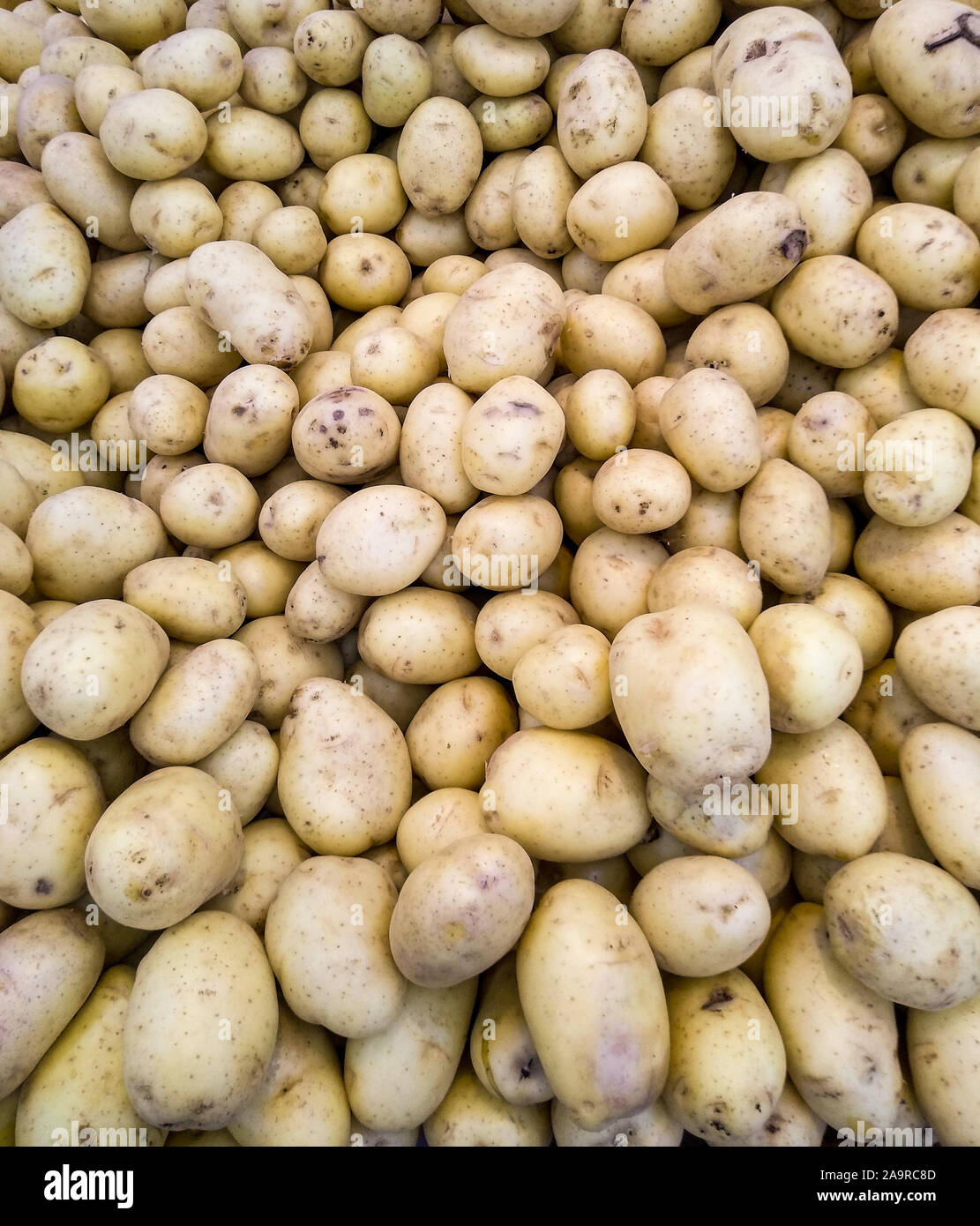Potato heap for sale full frame texture Stock Photo