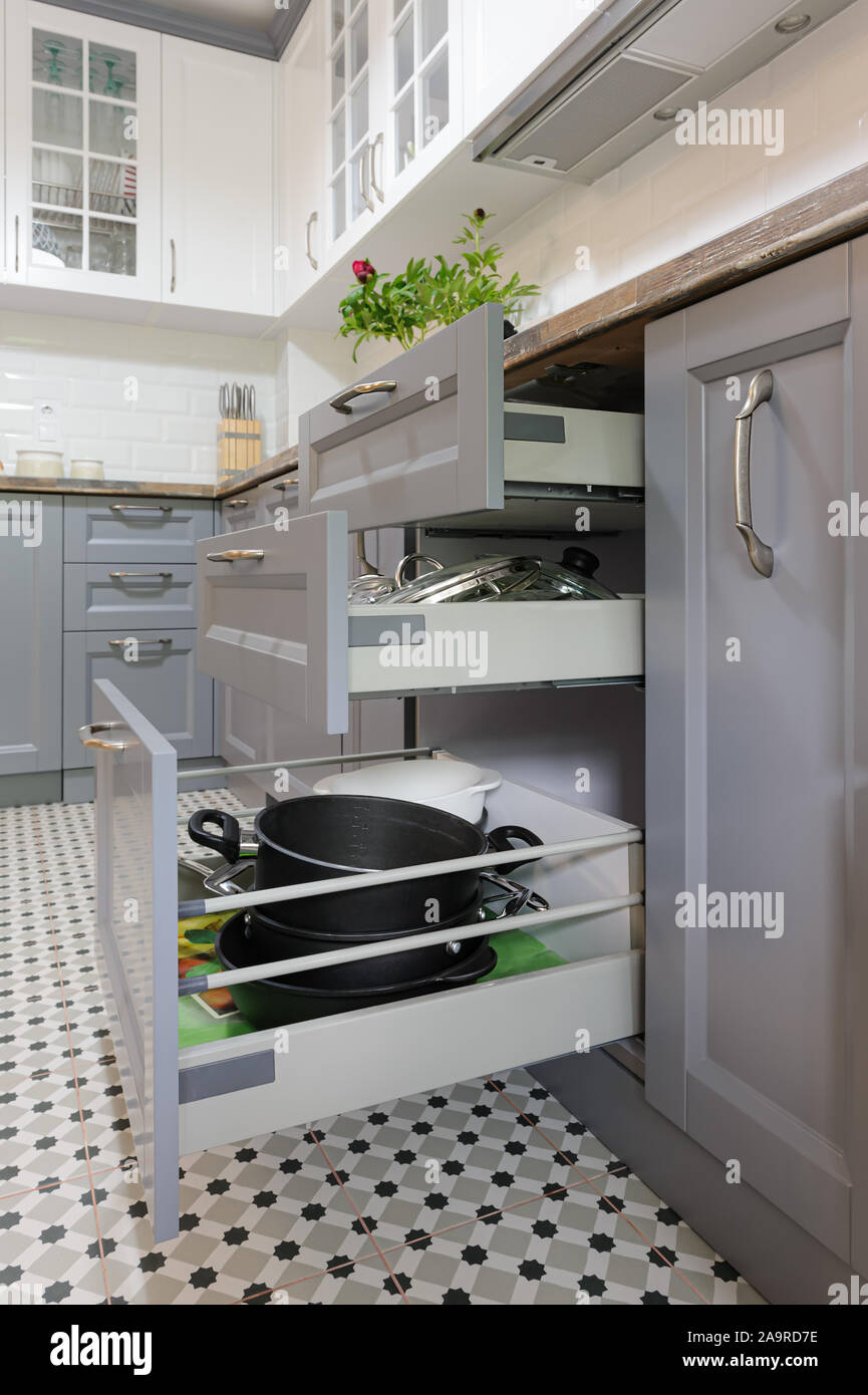 modern grey and white wooden kitchen interior Stock Photo - Alamy